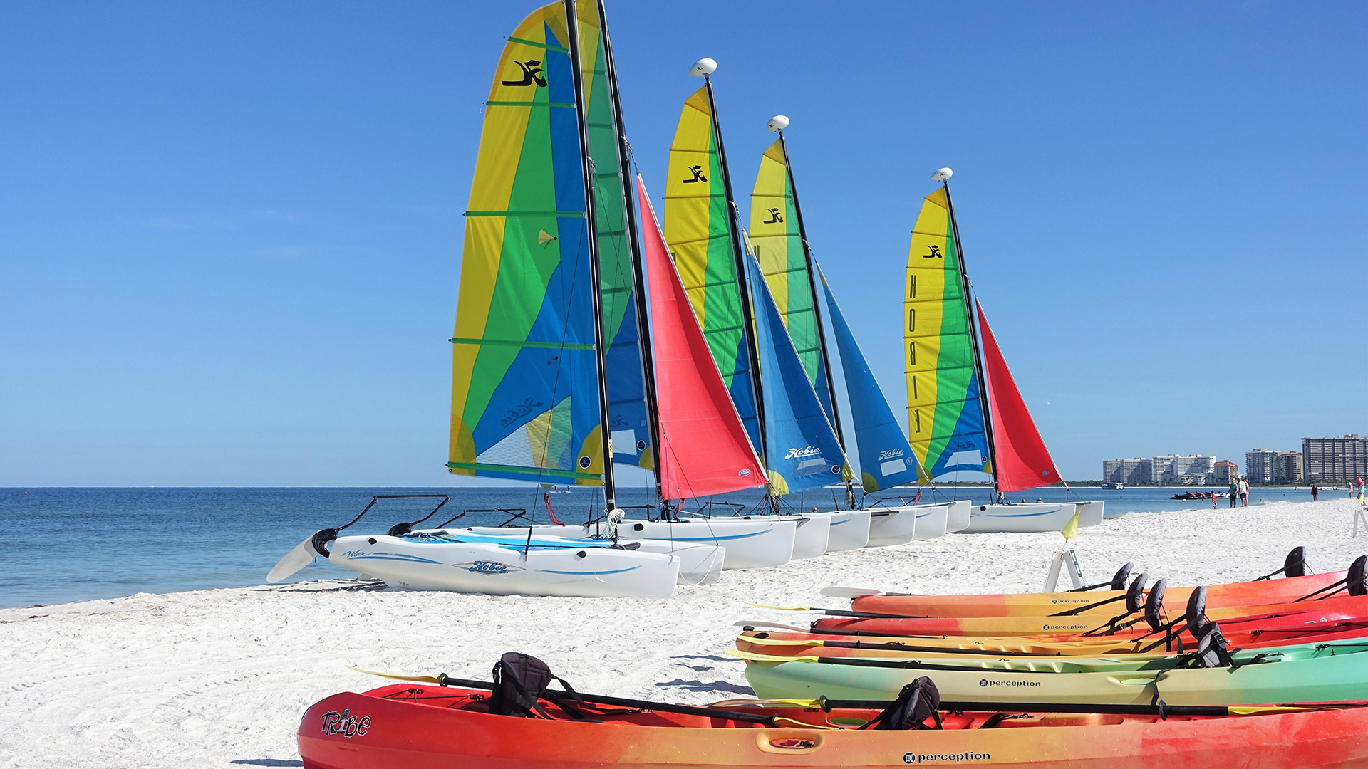 Ella Bay Team - beach with sailboats and kayaks
